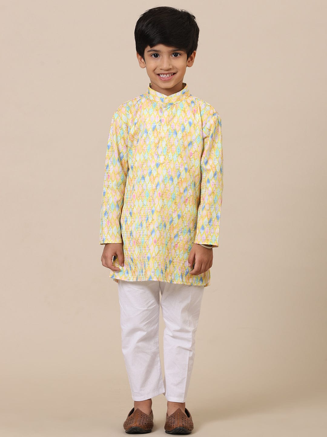 “Kids yellow kurta pajama set in cotton fabric, traditional ethnic outfit for weddings and Diwali”