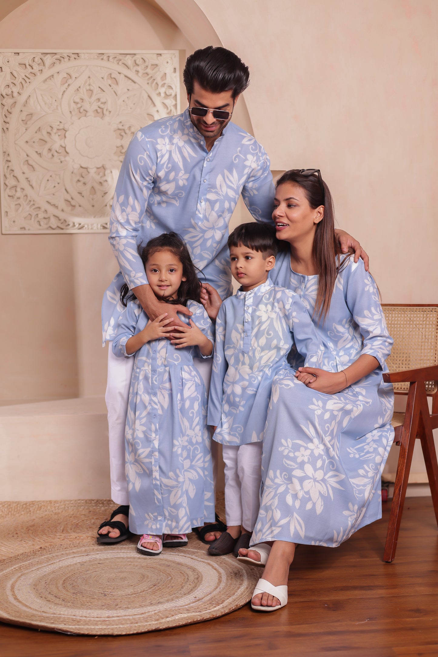 Soft cotton family combo dress set in soothing blue with all-over floral prints — includes men’s kurta, women’s dress, boy’s kurta, and girl’s flared dress. Perfect for full family twinning at festivals, vacations, or photoshoots.