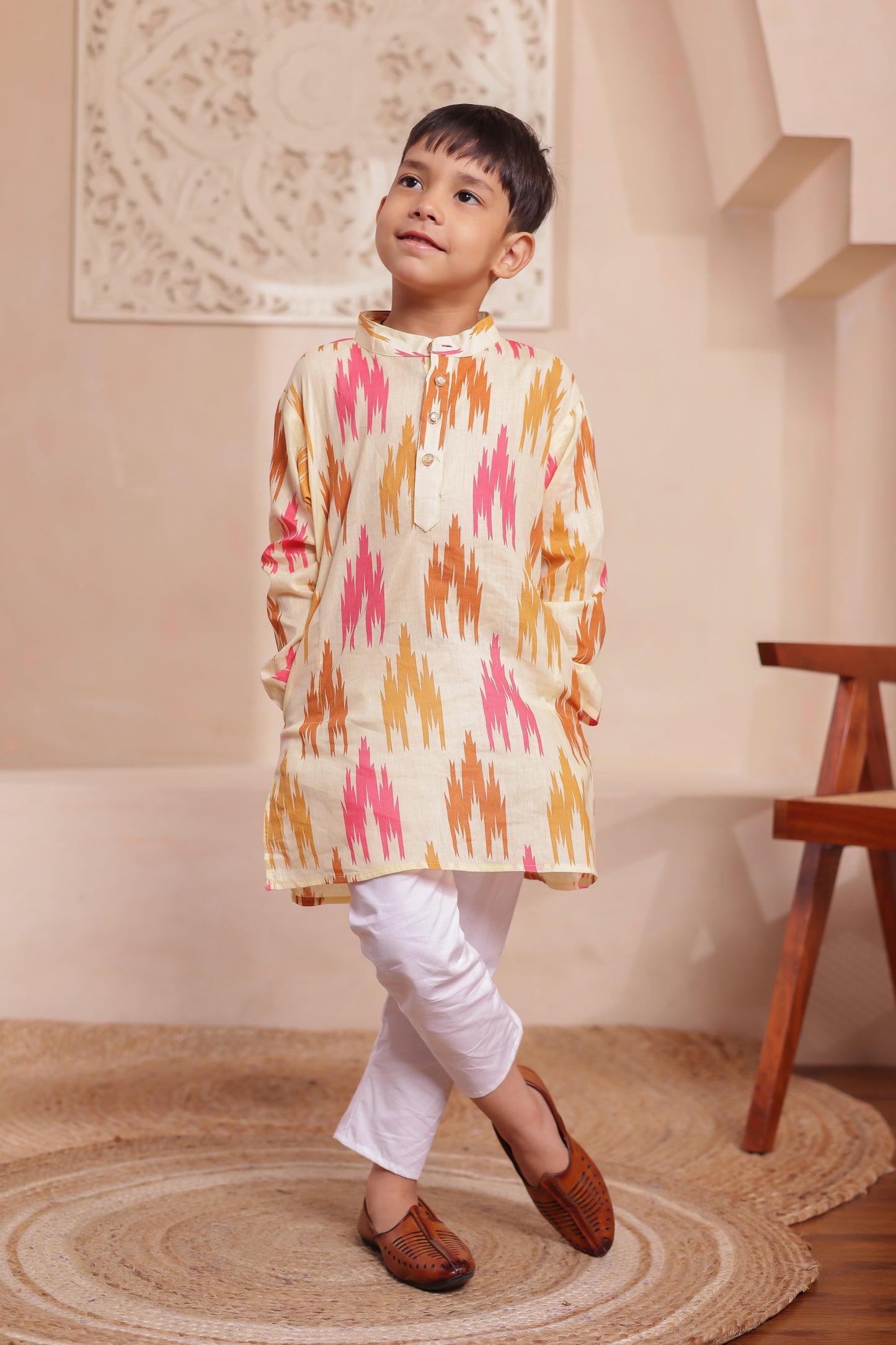 Boy in ikkat kurta-pajama — traditional cotton wear for boys, ideal for matching with dad or the full family combo.