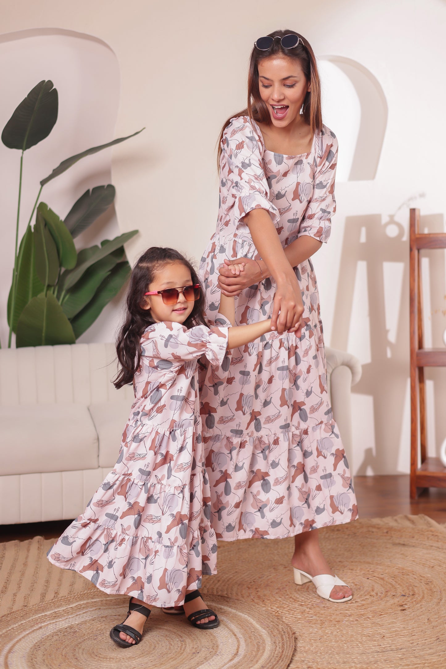 White Symphony abstract print twinning dress combo for mother and daughter — soft cotton fabric perfect for matching looks on holidays and festive occasions.