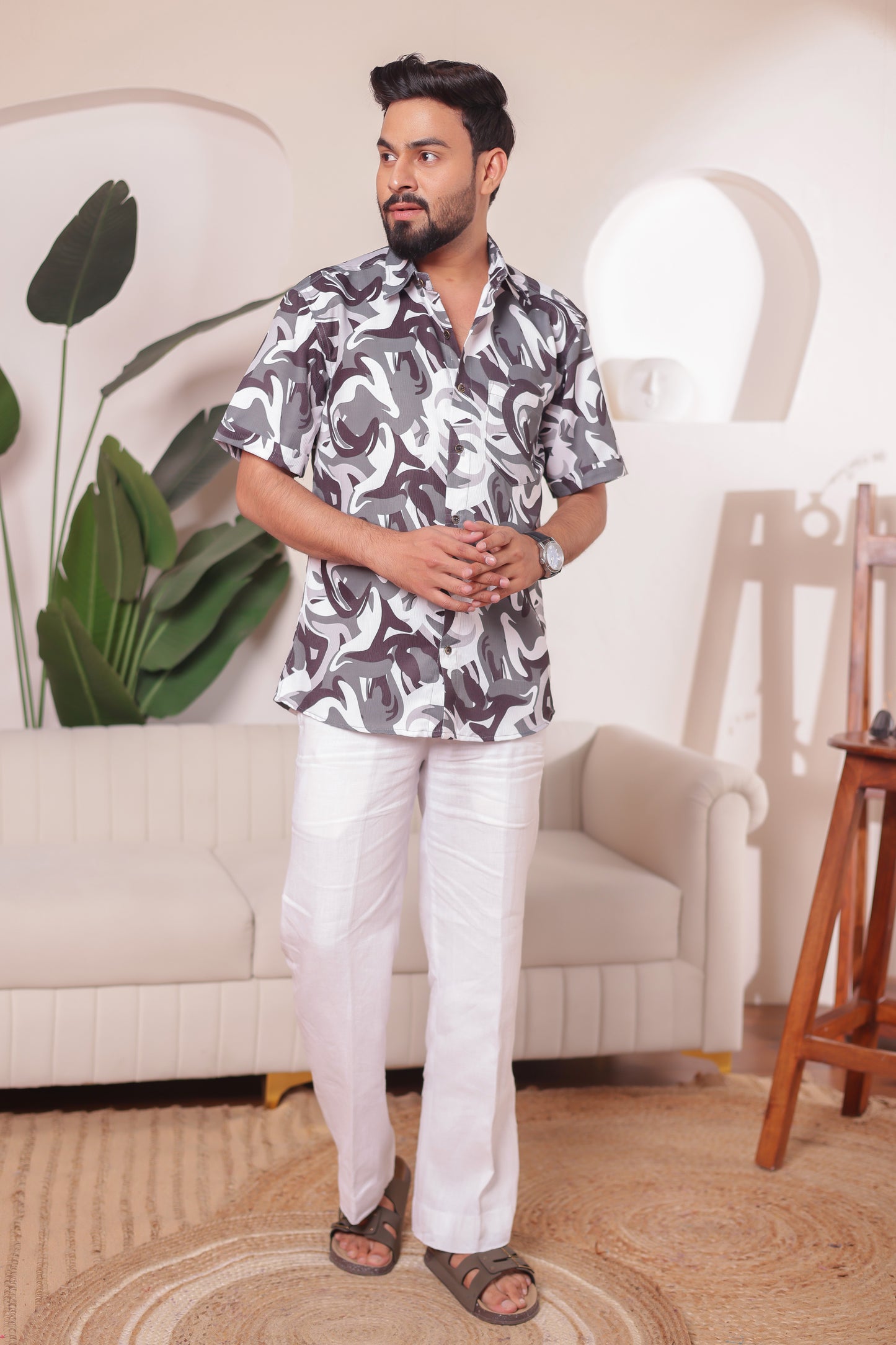 Man in abstract printed cotton shirt from Match Mitti Hues family matching outfit – comfortable and elegant, great for casual events and twinning.