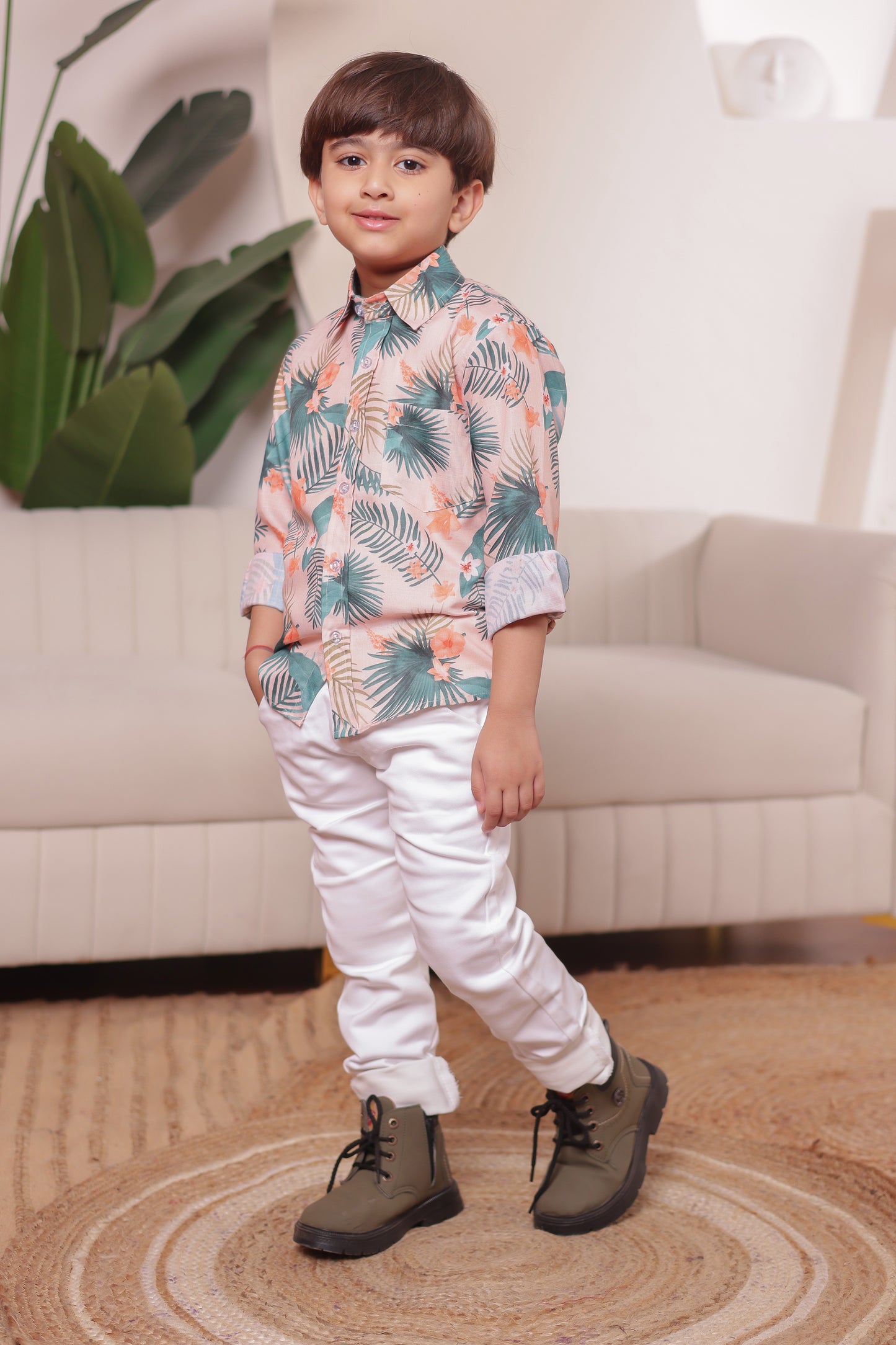 Boy in Desi Chic cotton shirt with leaf print—matching with dad for cute family twinning, festive events & casual days.