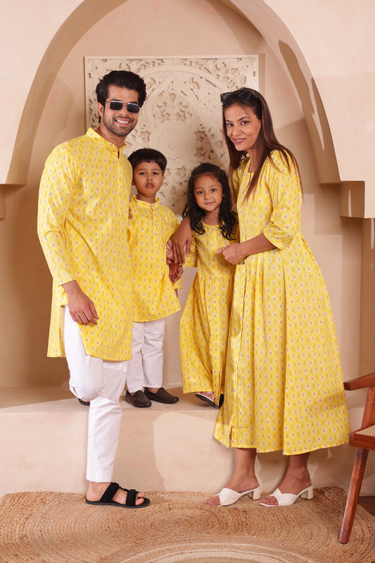 Haldi Vibes family combo dress set in vibrant yellow floral print, crafted in soft, breathable cotton. Includes kurta pajama for men and boys, and flared long dress for women and girls. Ideal for Haldi ceremonies, weddings, and festive twinning.
