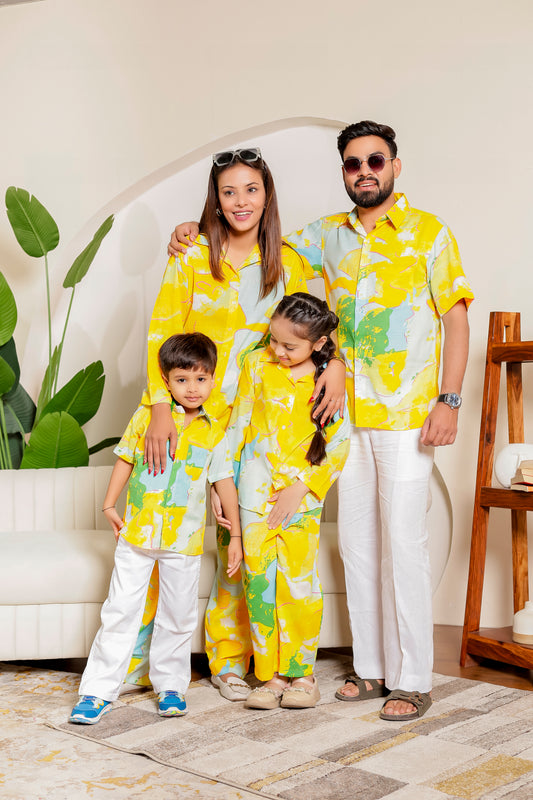 Citrus Bloom family combo in cotton with bright yellow abstract prints—matching co-ord sets and shirts for mom, dad, daughter, and son. Perfect for twinning on vacations, brunches, or casual summer outings.