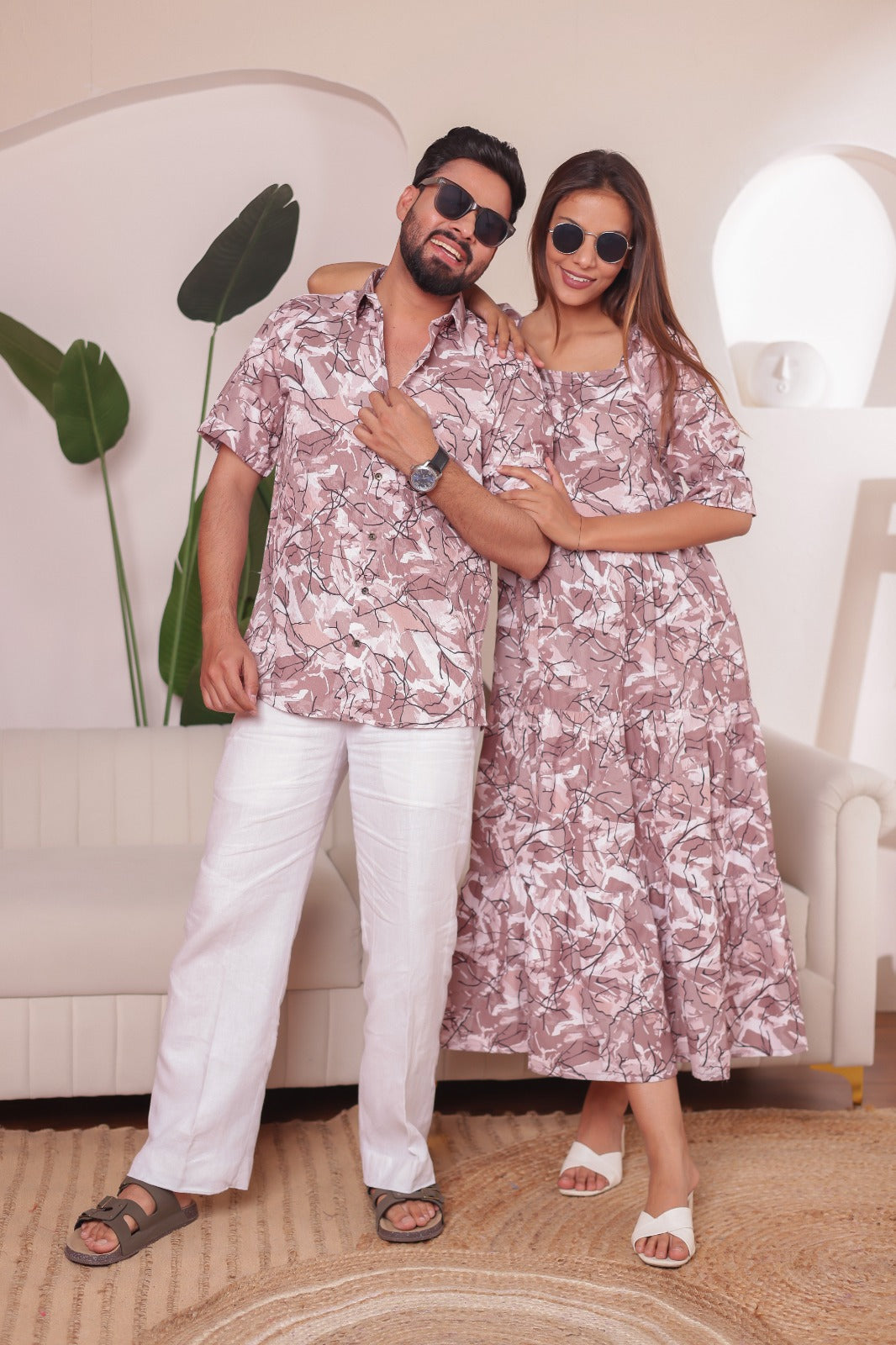 "Ocean Bloom mom dad family combo dress in leafy printed cotton—matching outfits for couples in soft pastels. Ideal for festive wear and photoshoots."