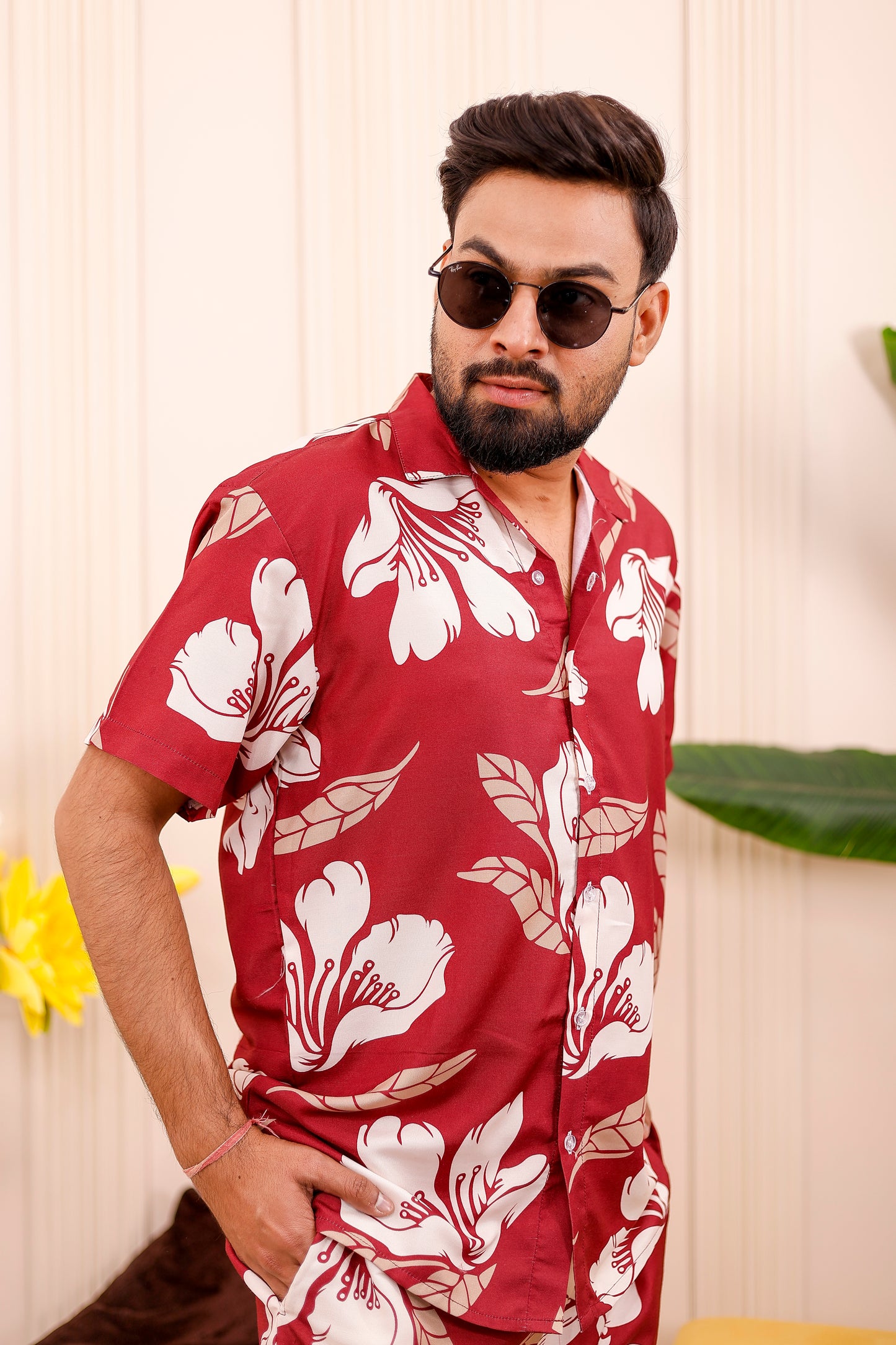 Close view of father wearing Crimson Bloom red floral matching co-ord set for photoshoot and summers.
