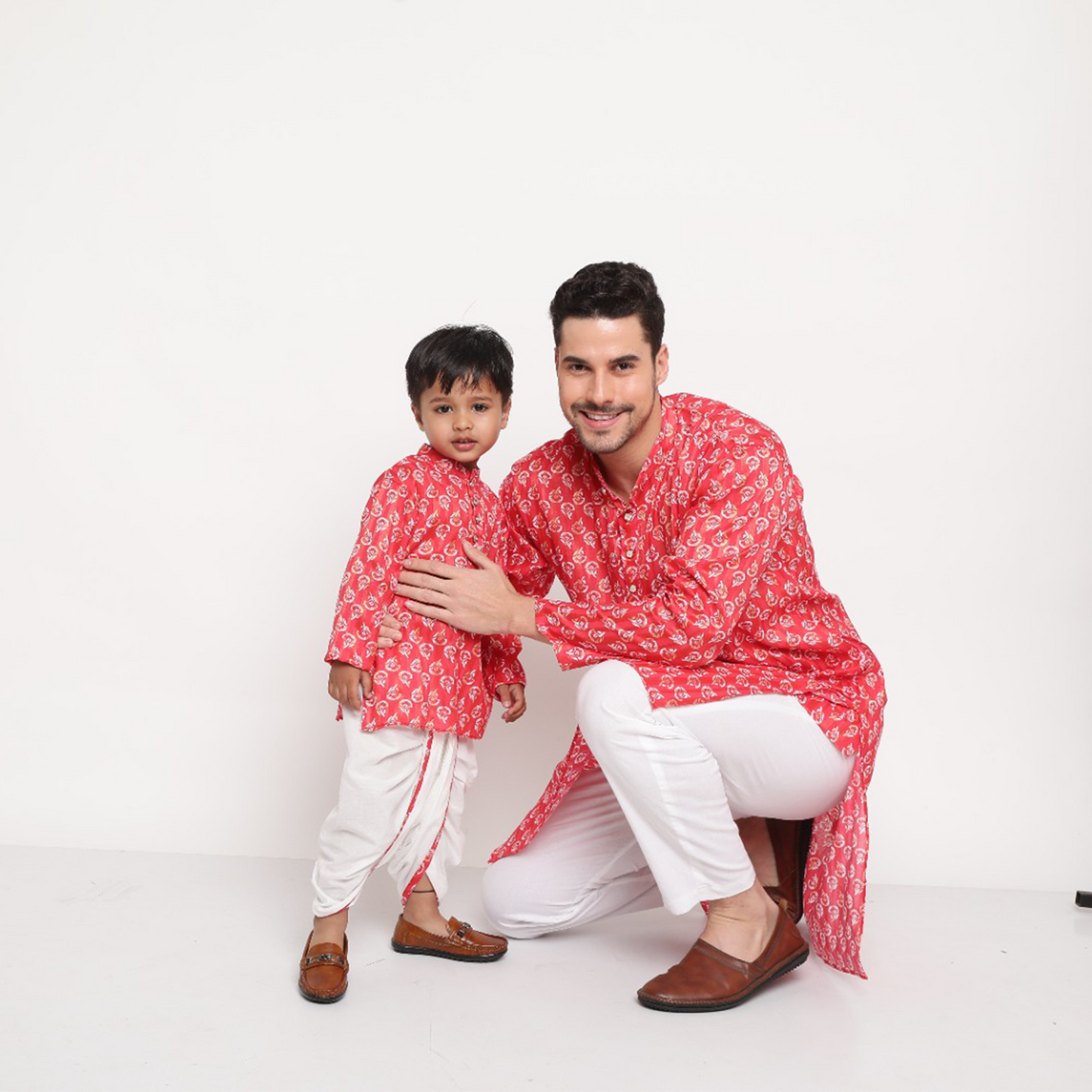 Father-Son Vibrant Red Ikkat Print Dhoti Kurta Pajama Combo Set