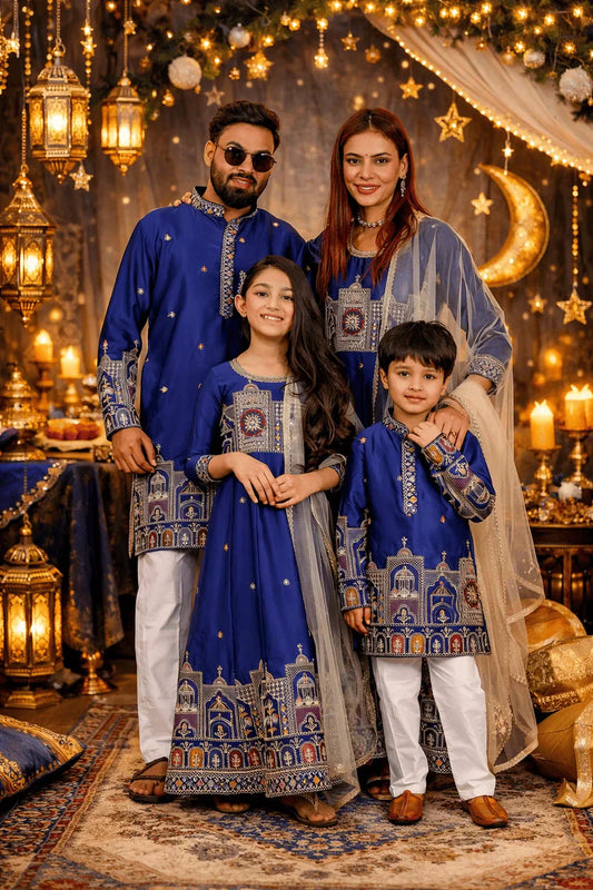 Family wearing blue heritage embroidered matching outfits celebrating Eid 2026 in elegant festive attire
