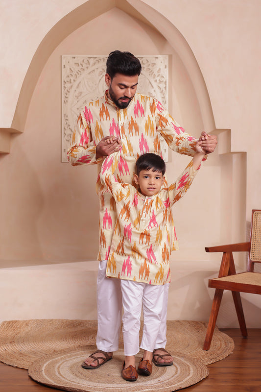 Father and son in matching ikkat print cotton kurta-pajamas — traditional family combo for festivals, occasions, and family dress sets.