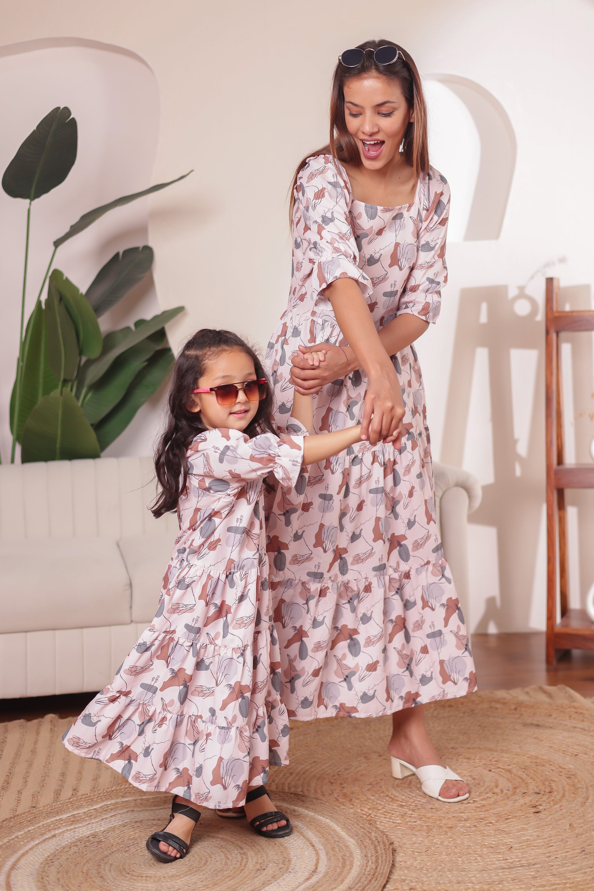 White Symphony abstract print twinning dress combo for mother and daughter — soft cotton fabric perfect for matching looks on holidays and festive occasions.