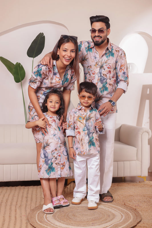 Family of four wearing Petal Pop Combo in soft cotton – stylish matching outfits perfect for outdoor parties and family celebrations