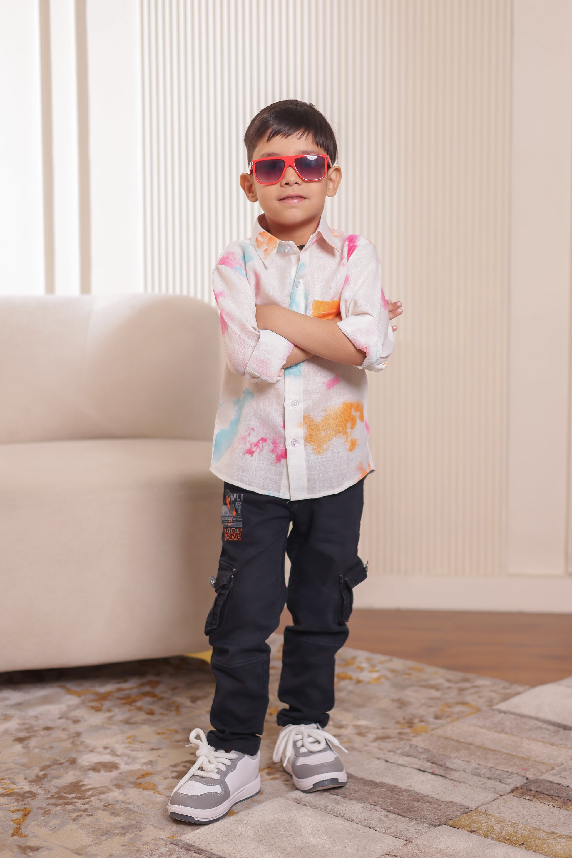 Boy in pastel splash cotton shirt from matching family outfits — part of a family dress set. Great for twinning & family matching clothing.

