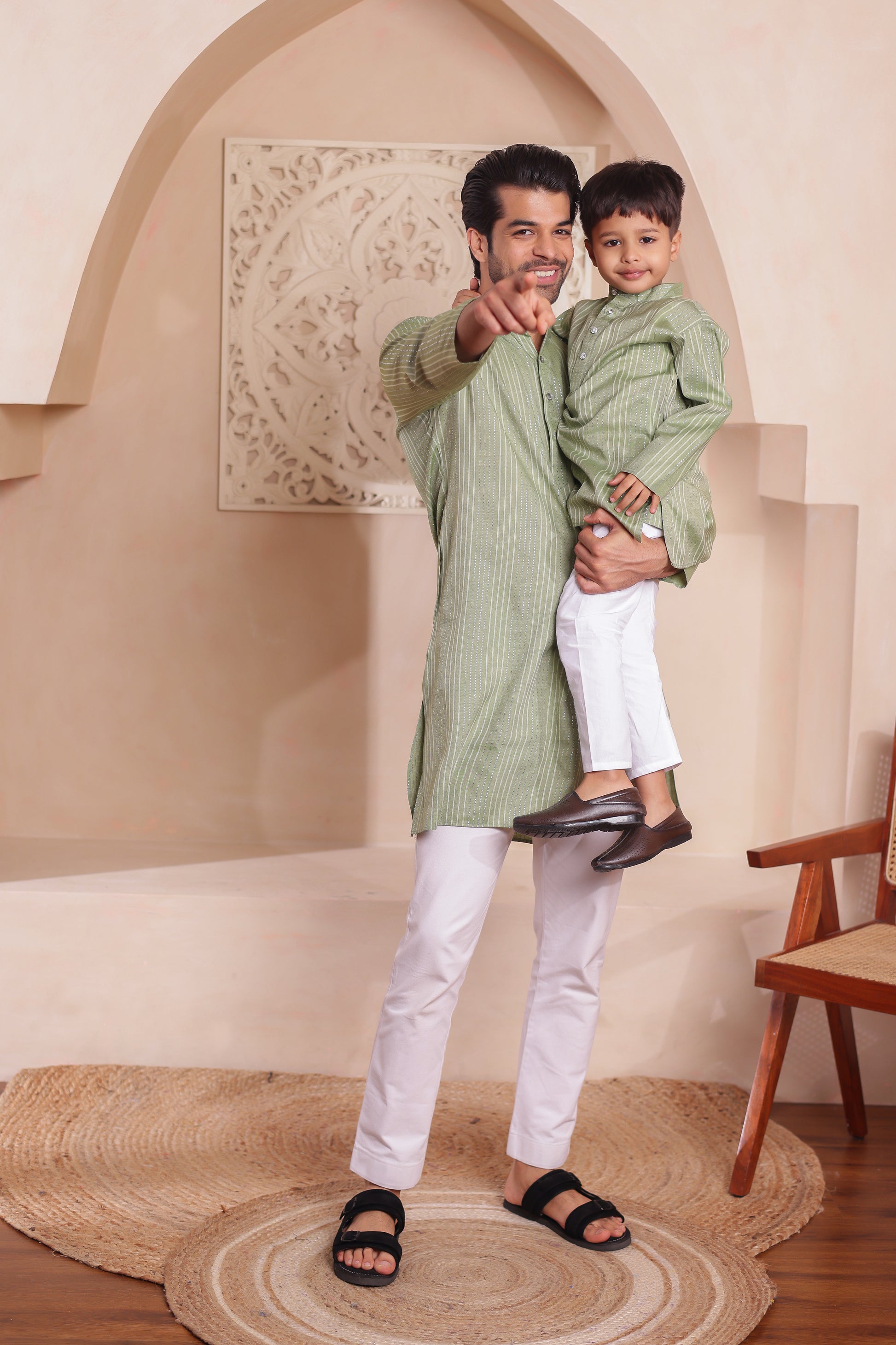 Father and son wearing green stripe kurta pajama combo set – matching ethnic wear for weddings and festive celebrations