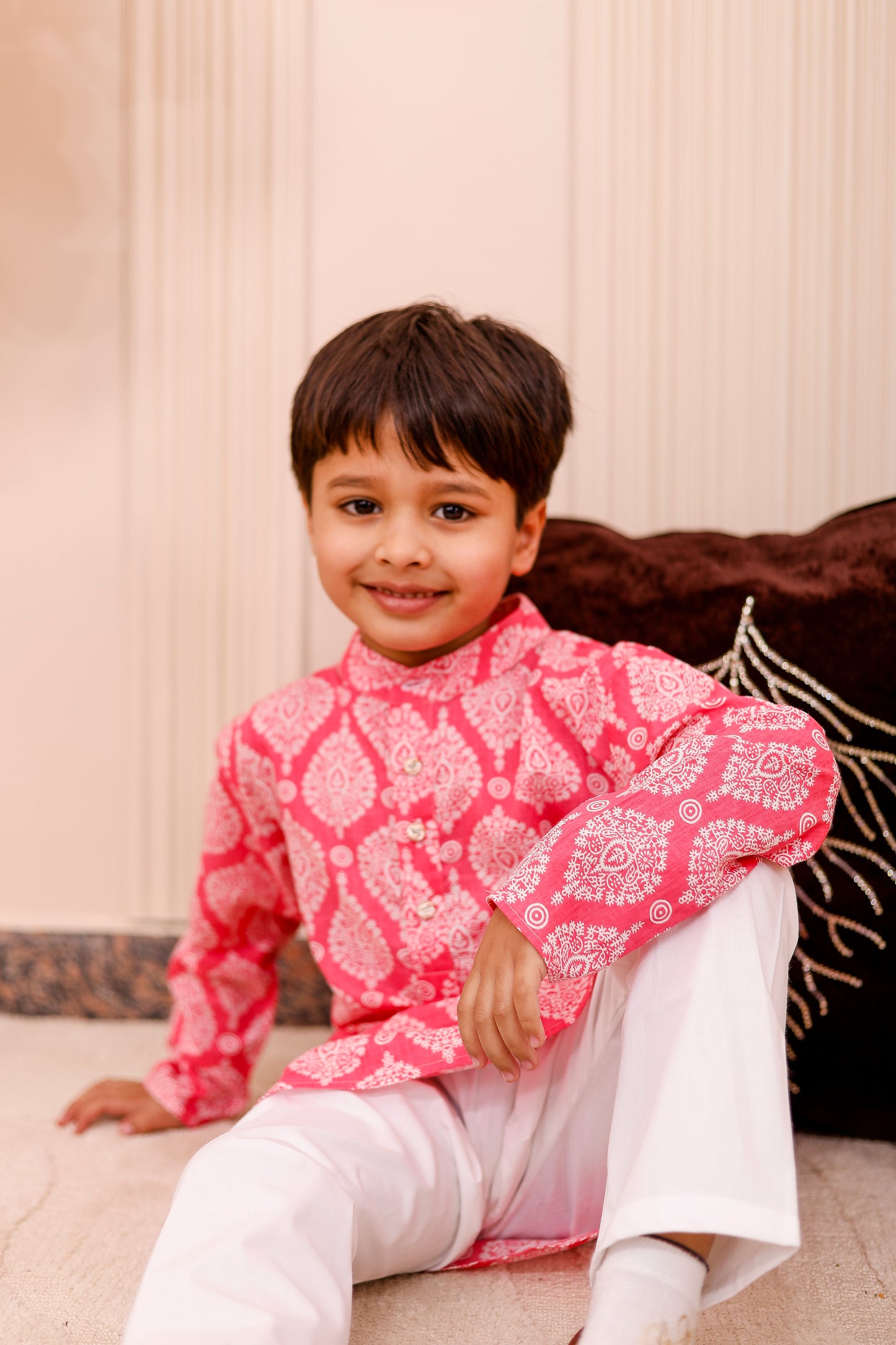 “Boy wearing royal pink family matching combo outfit for festive twinning”