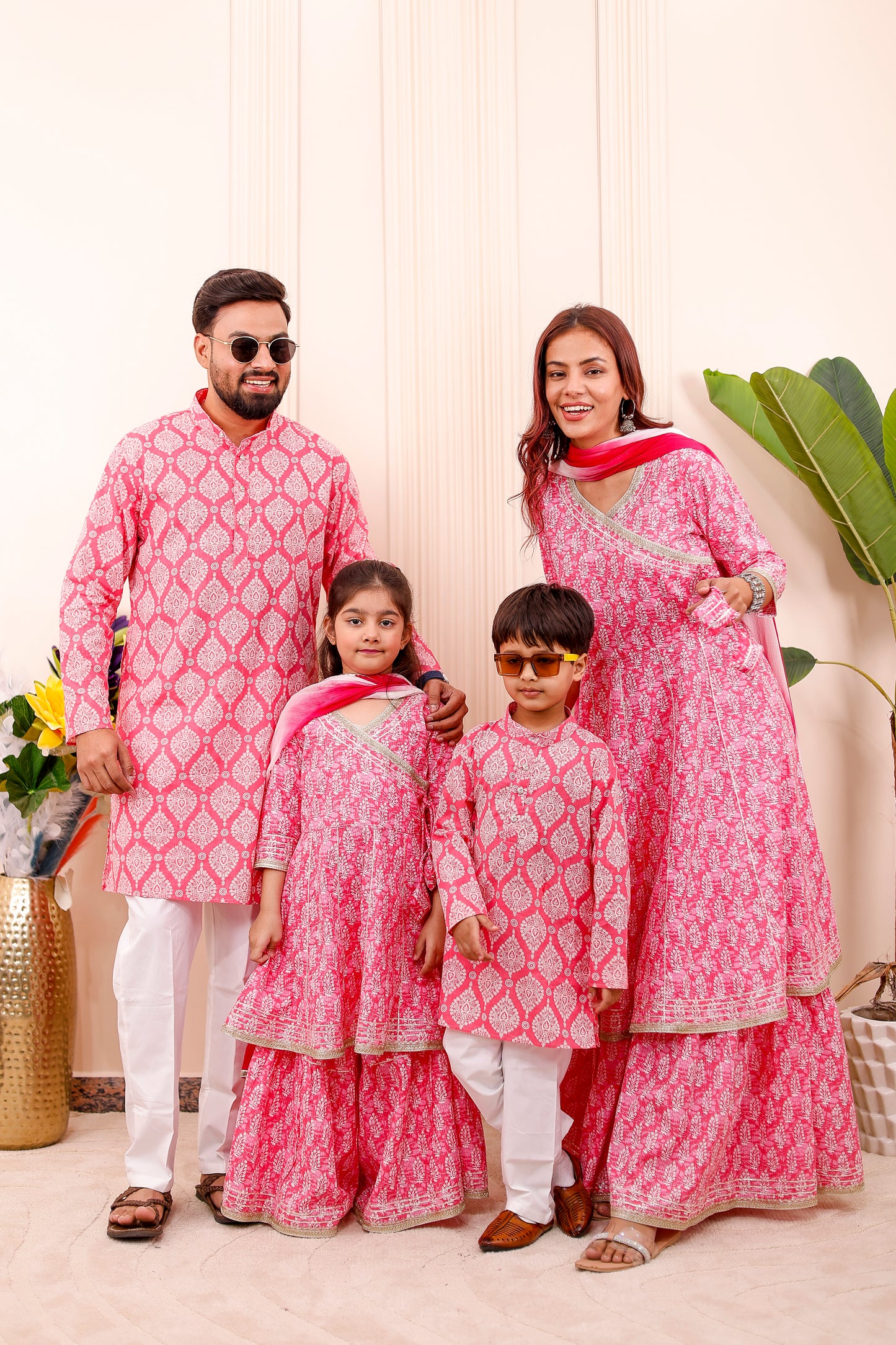 “Royal pink couple twinning matching combo outfits for festive occasions”