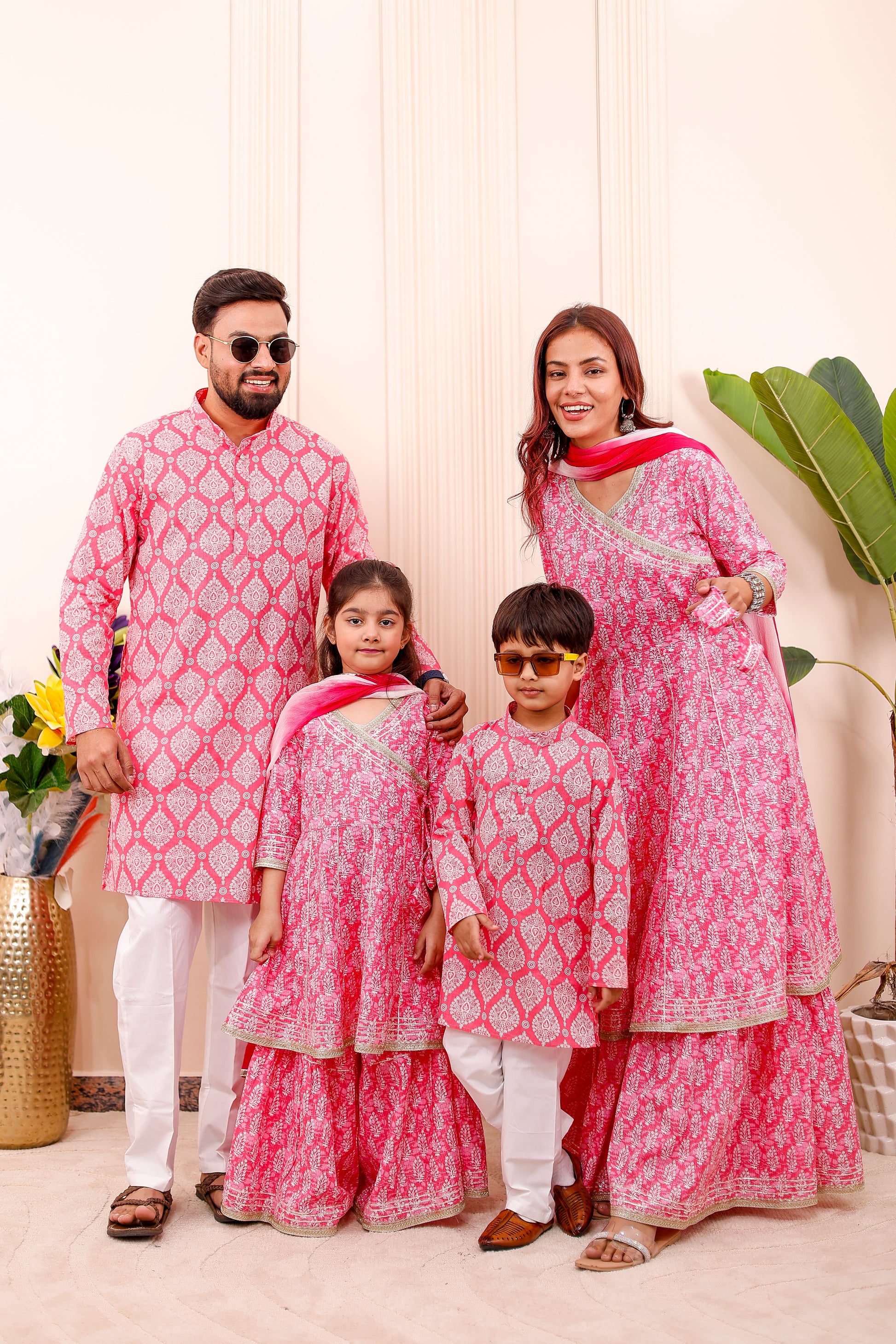 “Royal pink couple twinning matching combo outfits for festive occasions”