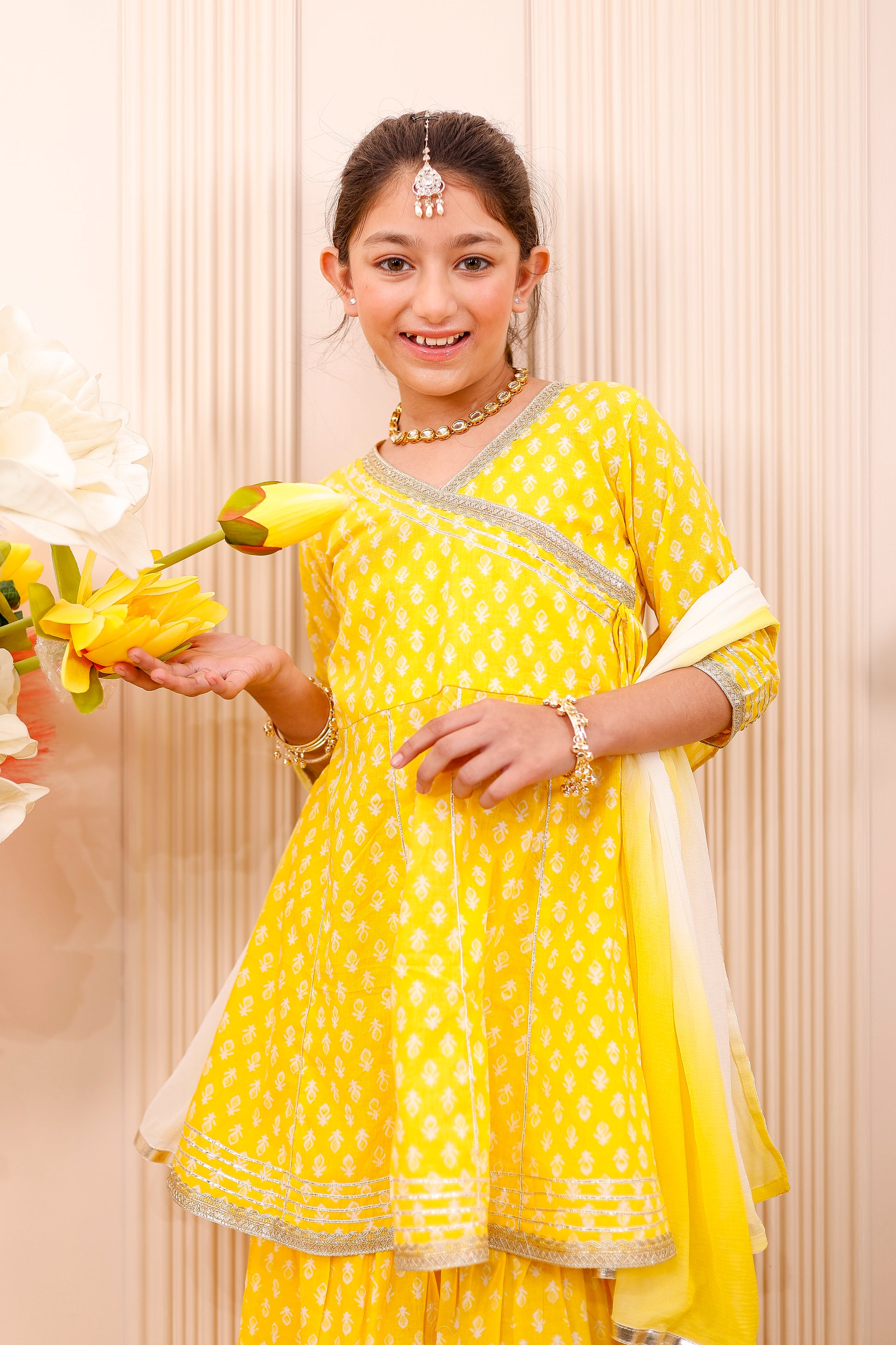 Girls’ yellow kurta and garara – adorable mother-daughter matching outfit for family festive occasions.