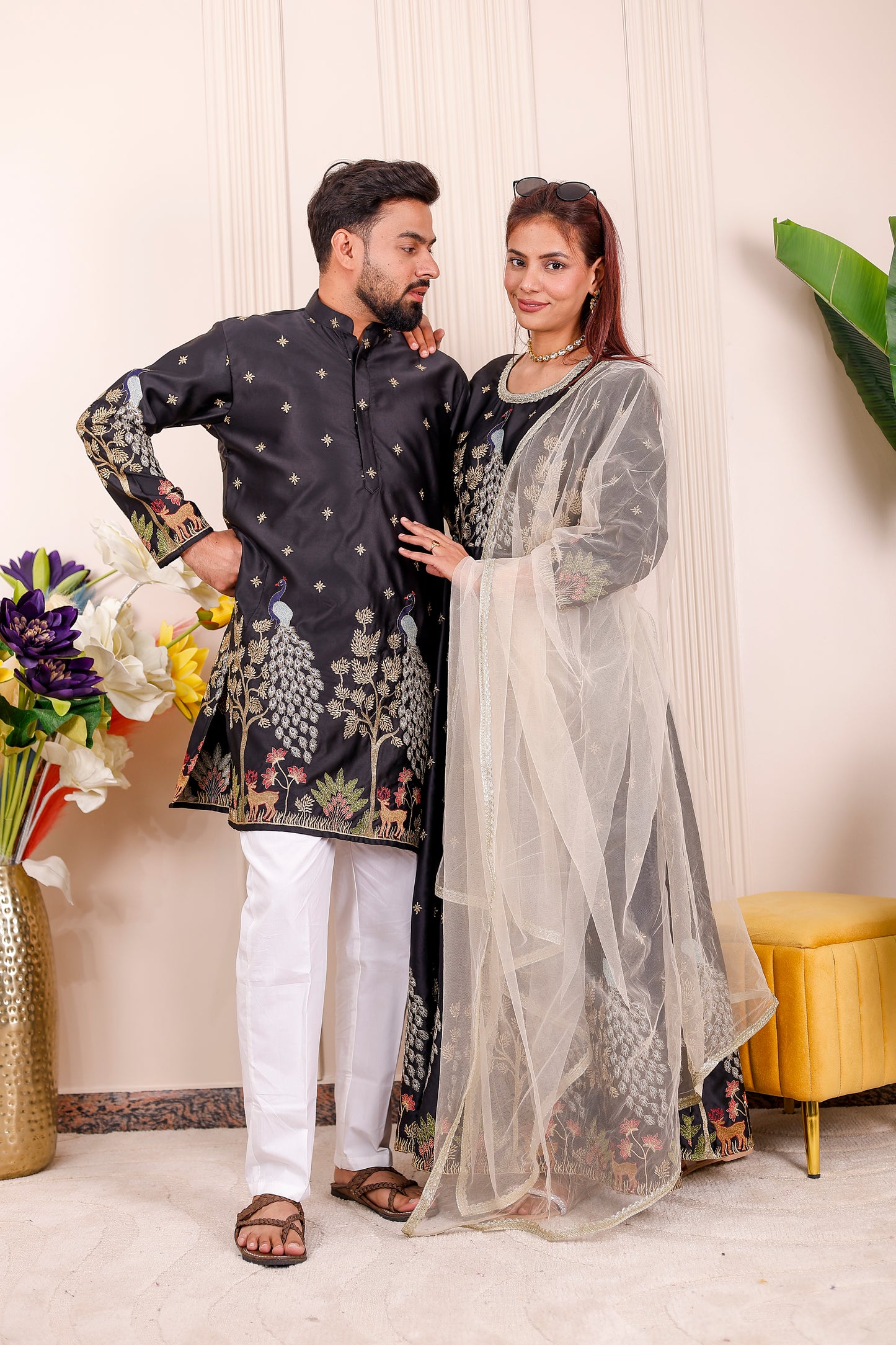 Black peacock embroidered matching outfits for couples in ethnic wear