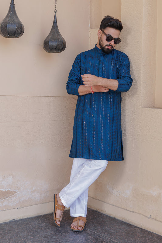 Man Wearing Royal Blue Schiffli Kurta Pajama – Elegant Festive Ethnic Wear for Weddings, Puja, and Traditional Occasions