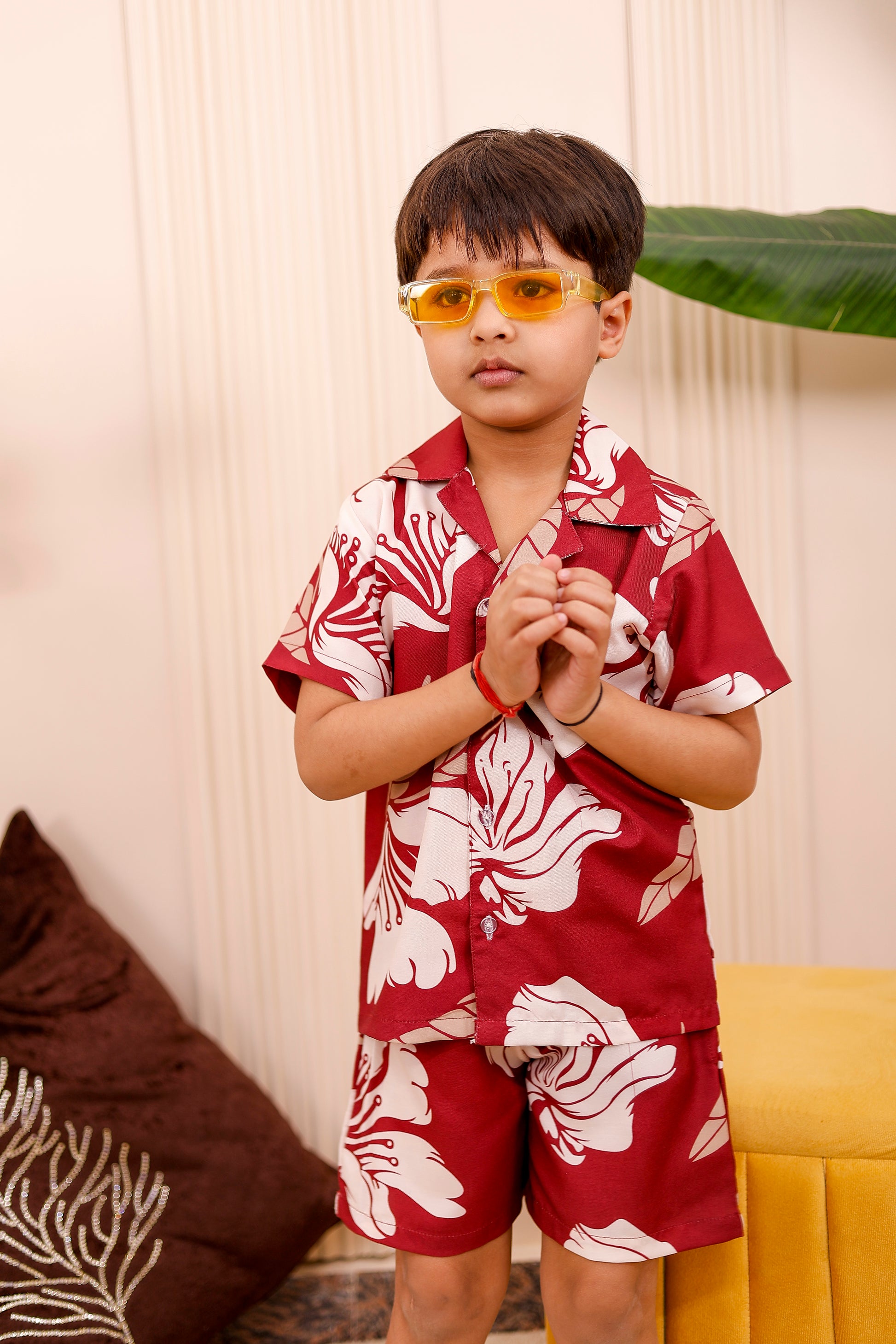 Boy wearing crimson bloom red printed matching co-ord set -perfect for father-son twinning