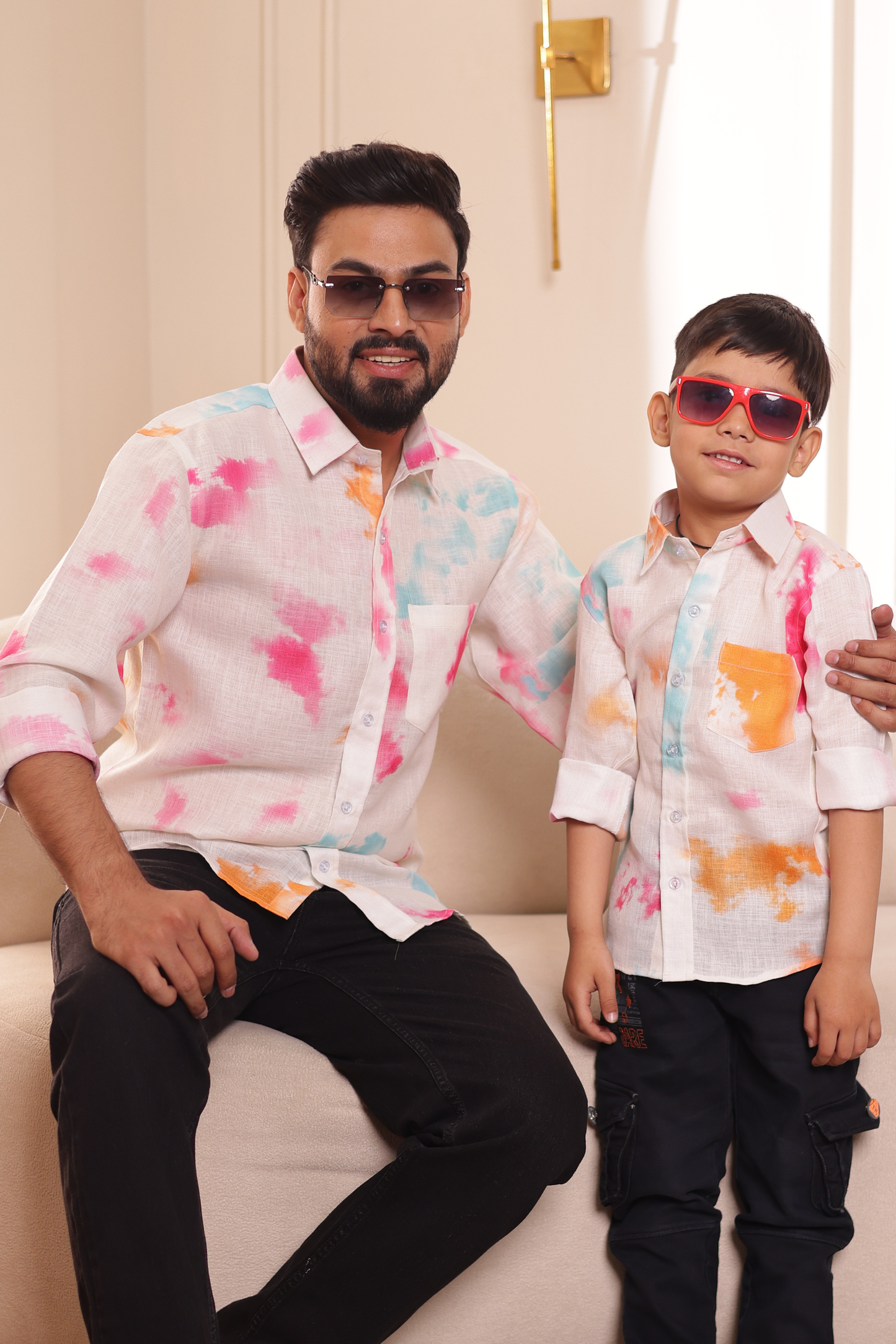Father and son wearing Cotton Candy matching shirts for summer wedding
