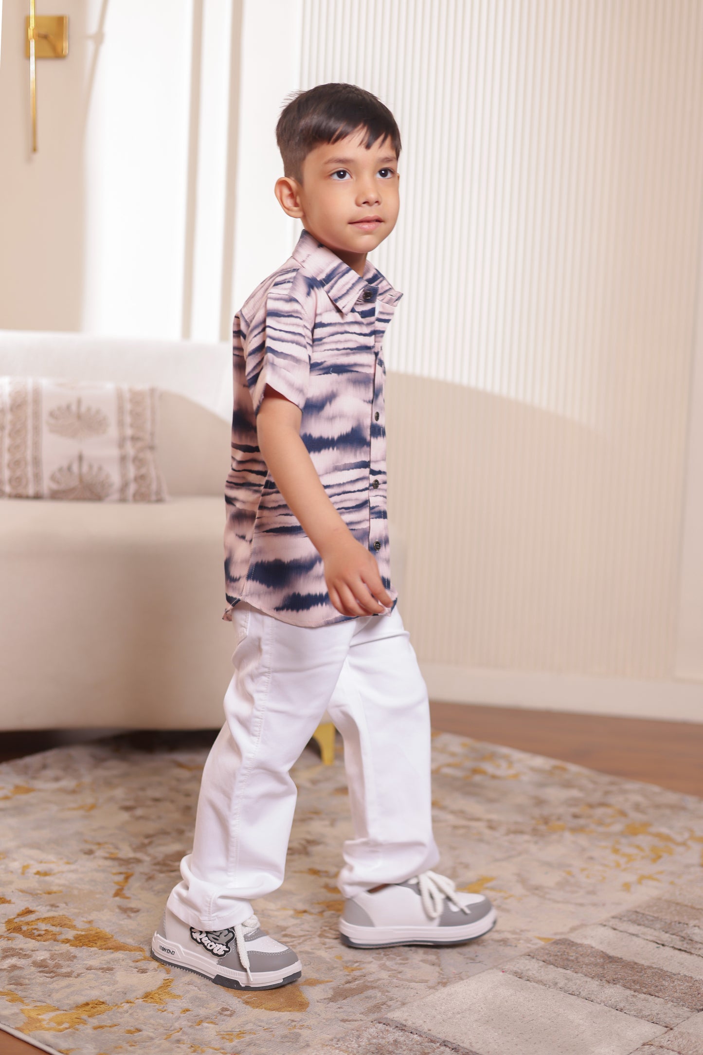 Son wearing Ocean Wave navy wave print matching shirt in muted mauve tone