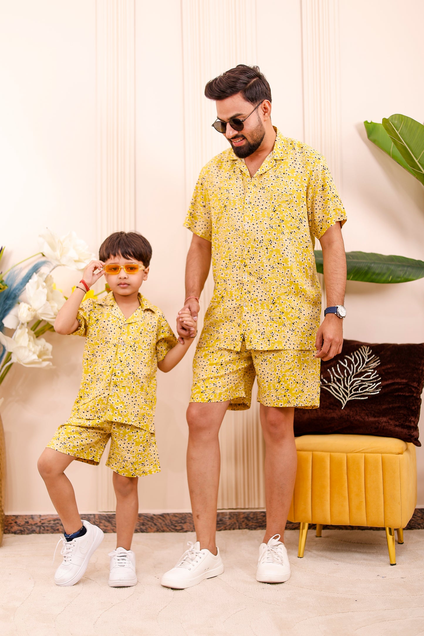 Father and son wearing a Summer Sunshine yellow printed shirt and shorts matching a co-ord set -perfect for summers.